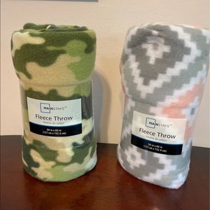 Two Brand New throw blankets 50” by 60”